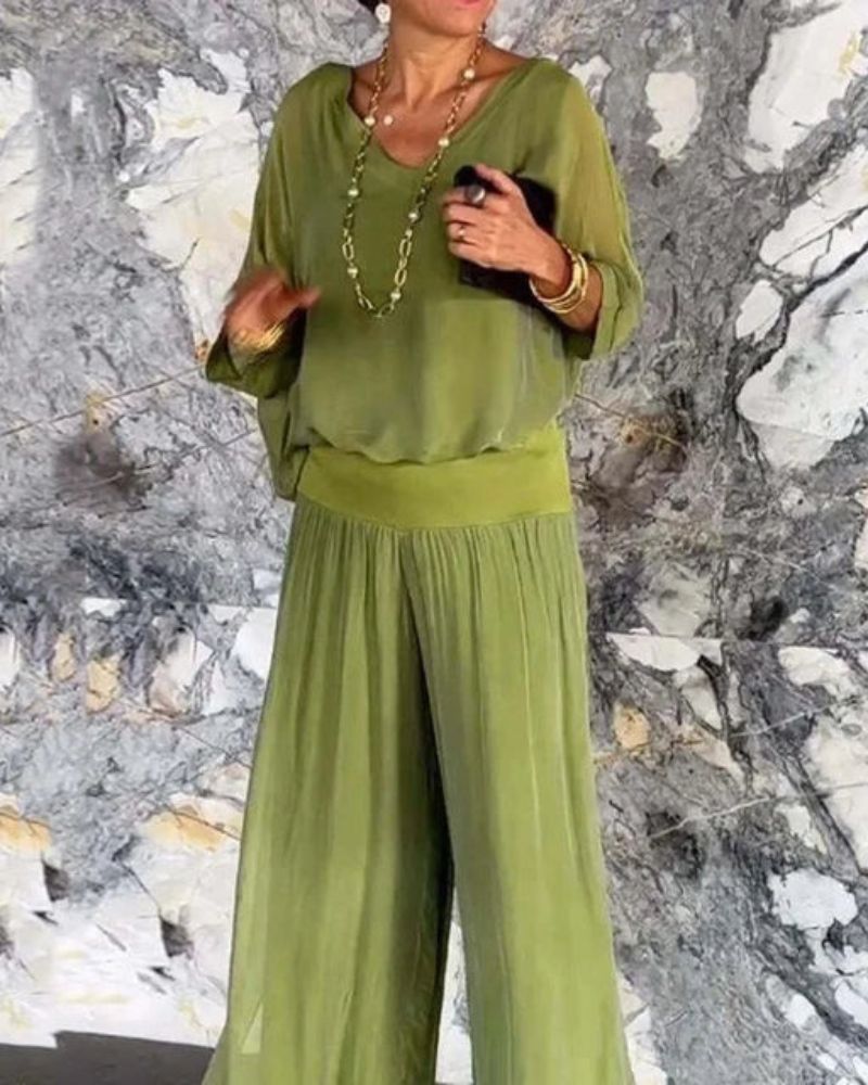 Astride – Elegantni komplet sa bluzom i širokim pantalonama