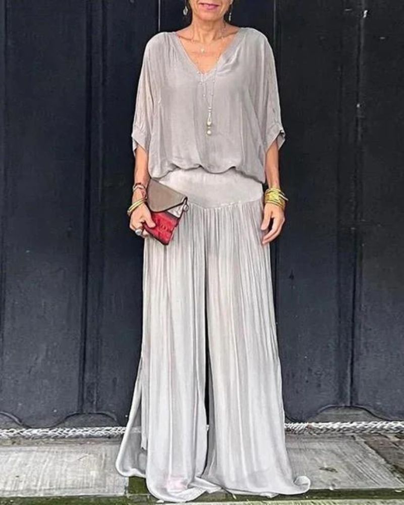Astride – Elegantni komplet sa bluzom i širokim pantalonama